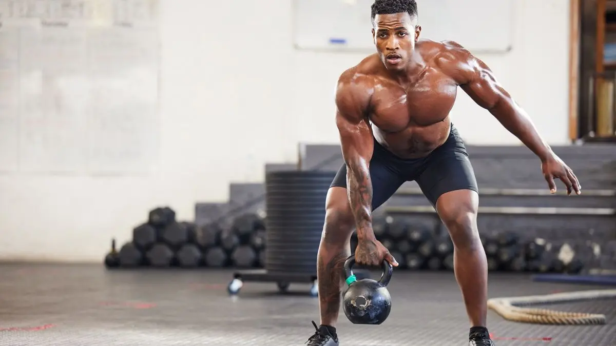 CrossFit athlete performing a kettlebell exercise