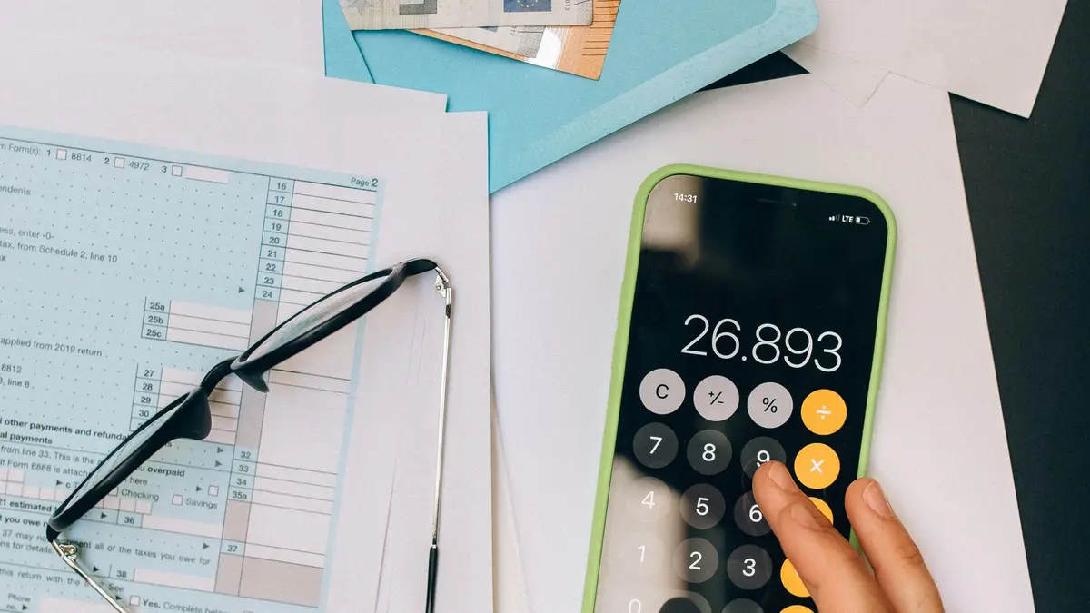 Financial documents calculator and smartphone for net-deposit review