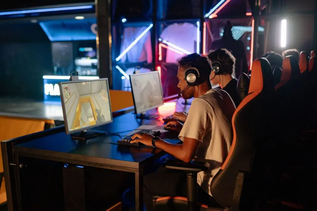 Esports players at gaming computers