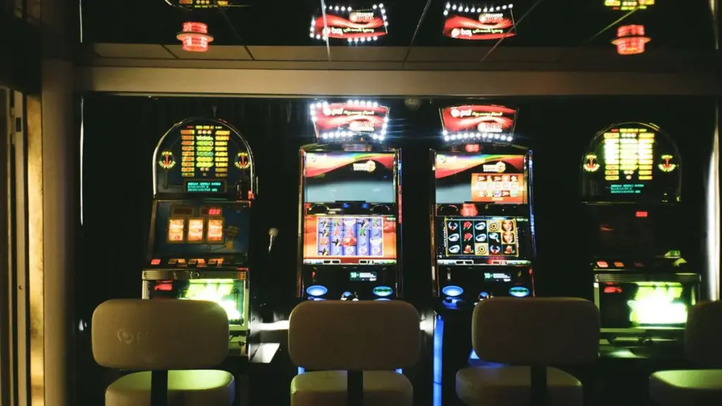 Row of slot machines illustrating UK online slot rules